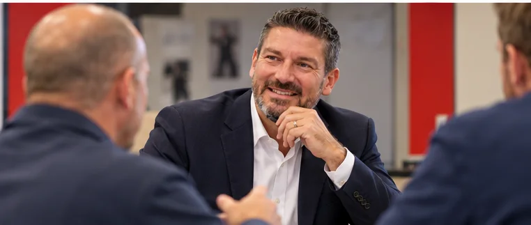Jared Scott in a small group leadership discussion